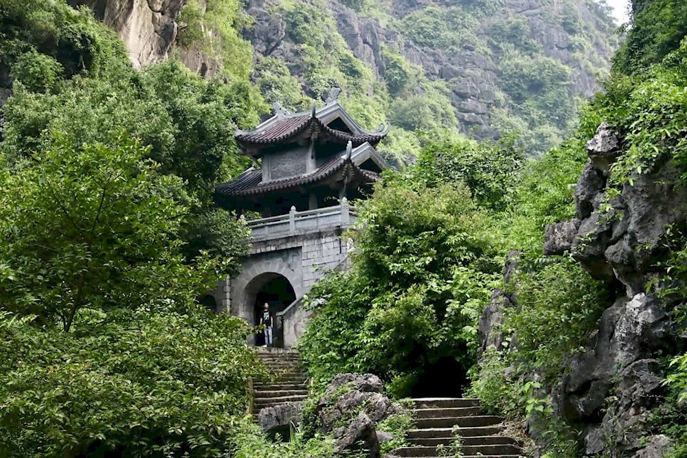 When morning mist veils the landscape, Am Tien emerges like a legendary valley